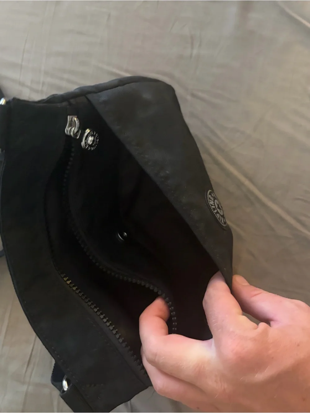 Kipling Black Sling Crossbody with Pom Pom Charm